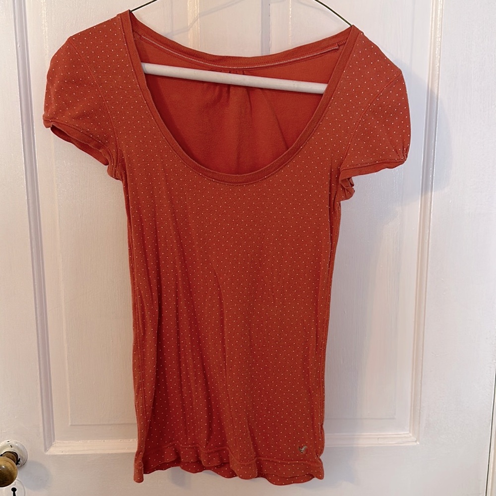Orange with white polka dot scoop-neck American Eagle tee